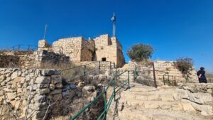 The ruins of the village mukhtar building on top of the hill - Castel