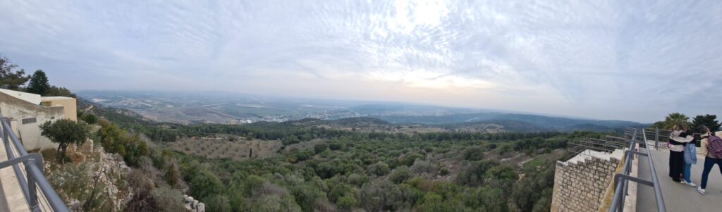 View from the roof top. The V shape on top of the picture is Ramat David Airbase. Aircraft kept taking off from it, although it is Sabbath morning and the cease fire in the north is kept. Mukhraqa