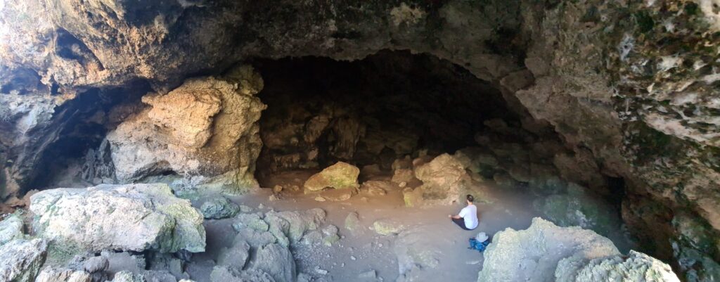 Sfunim cave, one is meditating while the rest of the hikers stay outside not to disturb the bats